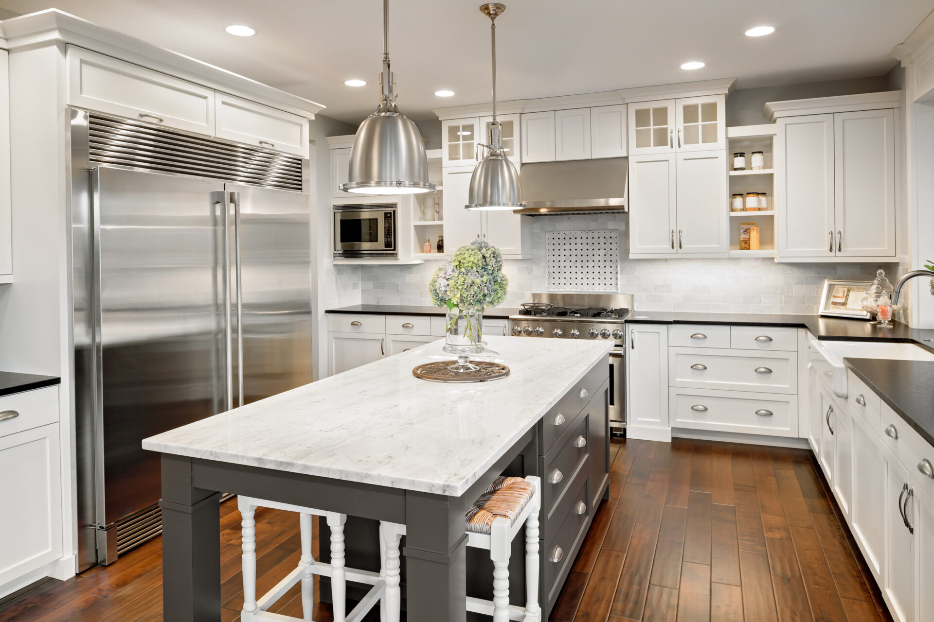Beautiful Kitchen in Luxury Home with Island and Stainless Steel Grocery Store Design and Construction