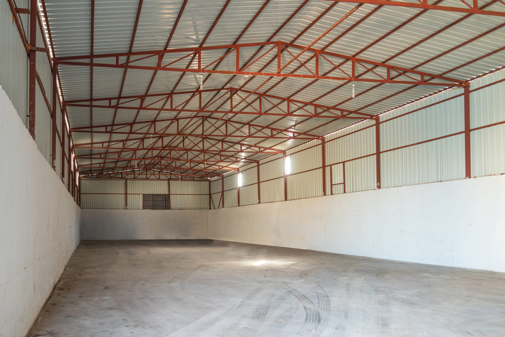Empty and old abandoned factory warehouse built of iron construction Industrial Building Design & Construction
